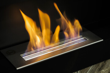 Burning eco bio fireplace close-up