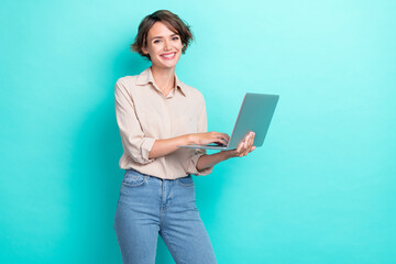 Photo of young charming attractive businesswoman using her laptop count financial profit good mood...