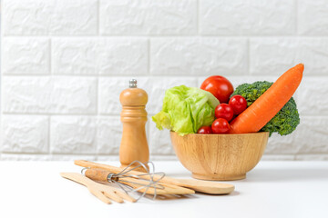 Healthy care for body slim.  Diet and healthy fresh vegetable for detox body slim fit for with kitchenware health lifestyle , white background. Weight Loss and Diet Concept