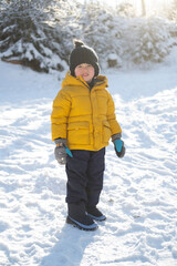 Fototapeta na wymiar Winter fun is the best for this little boy.