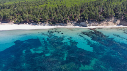 Drone view of crystal clear blue water on the beach of Kabatepe near Çanakkale, Turkey