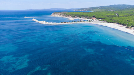 Drone view of crystal clear blue water on the beach of Kabatepe near Çanakkale, Turkey
