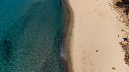 Fototapeta na wymiar Drone view of crystal clear blue water on the beach of Kabatepe near Çanakkale, Turkey