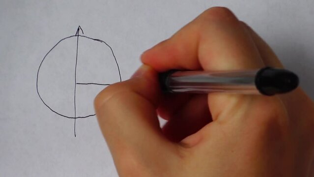 Writing of mathematical formulas on paper.