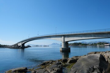 Fjord bridge on the blue sea and blue sky background