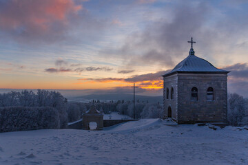 Fototapeta na wymiar Sunrise in (Łysa Góra) Lysa Gora, Swiety Krzyz mount hilltop near Nowa Slupia village 