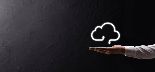 Business woman holding icon cloud computing network and icon connection data information in hand. Cloud computing and technology concept.