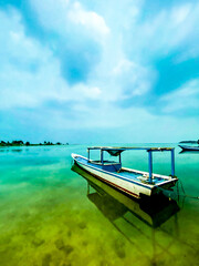 Fototapeta na wymiar Fishing boats on a very beautiful Indonesian island