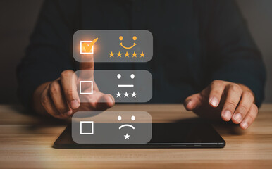 Businessman gives ratings to service experience on a smartphone, Service Provider Satisfaction Ratings and Evaluations,  Satisfaction concept and Customer service