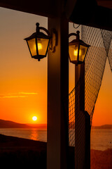 Panorama silhouette lanterns at sunset.