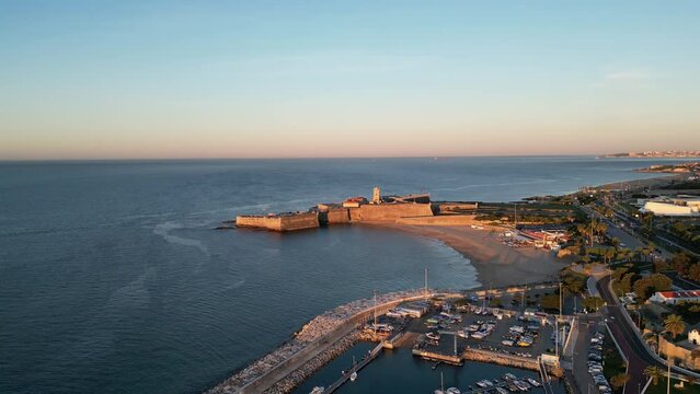 Aerial view of the beautiful Torre beach at soft sunset