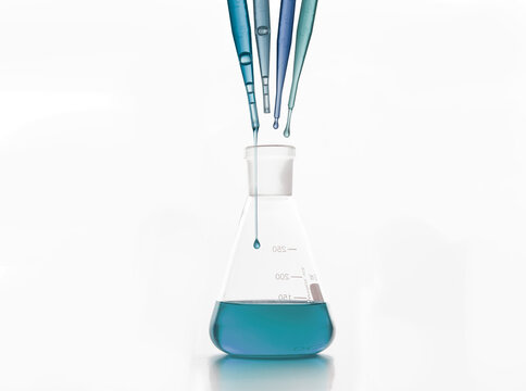 Droppers over laboratory flask placed on white surface