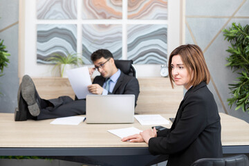 Fototapeta premium Confused woman in suit feeling stress on interview in the office