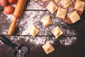 Cheese , Spinach ravioli , on a wooden table, selective focus, rustic style, horizontal, no people,