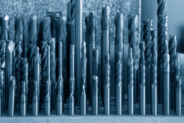Close-up scene the group of used cutting tools for CNC milling machine.