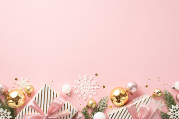 Christmas decorations concept. Top view photo of big gift boxes with ribbon bows fir branches gold white pink baubles snowflake ornaments and confetti on isolated light pink background with copyspace