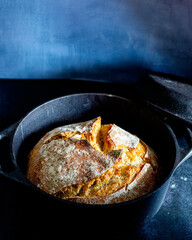 Baking bread at home in a cast iron pot

