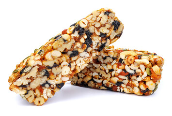 Two pieces of gozinak from different nuts isolated on white background.