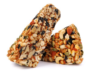 Kozinak from various nuts with dried fruits isolated on white background.