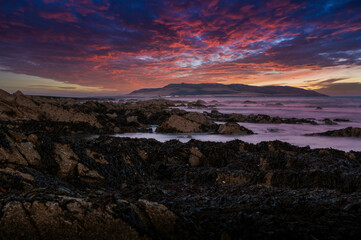 Fototapeta na wymiar Island covered withe Fogsea and a Sunset