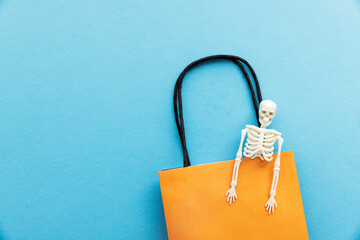 Empty trick or treat halloween candy bag with a skeleton
