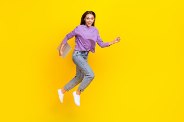 Fototapeta na wymiar Full length photo of cheerful excited lady hold modern gadget go empty space black friday shop sale isolated on yellow color background