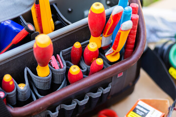 electricians tool bag full of tools