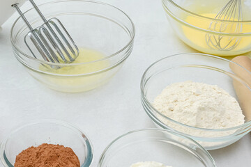 Making chocolate cake. Step by step recipe, ingredients close up