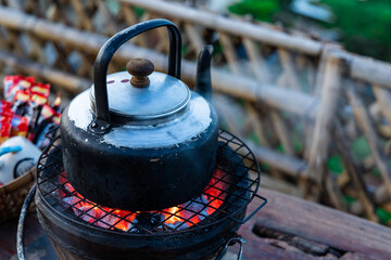 hot water in kettle on wood stove