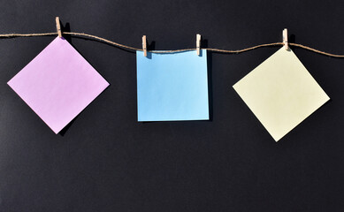 A collection of various paper notes. Isolated black background.