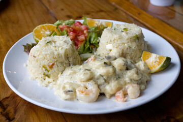 Fish dish with salmon and shrimp in San Jose, Costa Rica.
