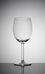 empty wine glass on a white background with vignetting