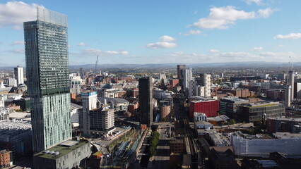 Fototapeta na wymiar Aerial view of Manchester City centre with modern buildings and landmarks. 