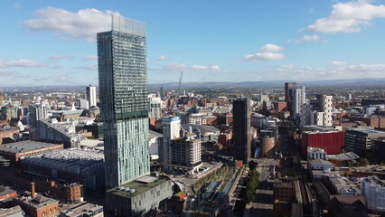 Fototapeta na wymiar Aerial view of Manchester City centre with modern buildings and landmarks. 