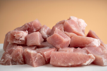 sliced fresh pork meat, pieces of raw meat for barbecue