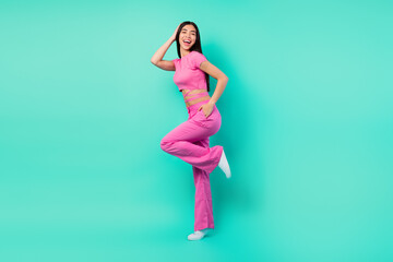 Full length photo of lovely cute lady in stylish set of clothes enjoy weekend on dance floor...