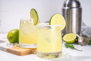 Boozy classic tequila  margarita refreshing alcoholic sweet and sour cocktail, with lime,  tequila,...