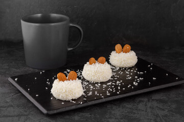 delicious dessert creamy souffle decorated with coconut chips and nuts