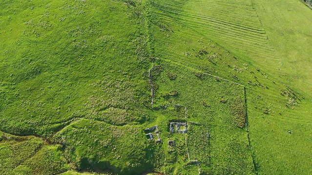 Aerial views of ruins and round sheepfolds at Gortmore in Northern Ireland