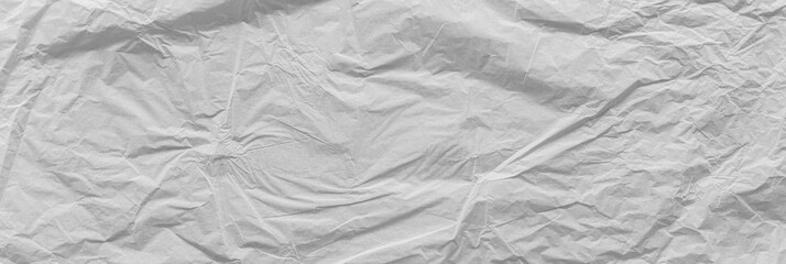 Old crumpled paper texture background. Vintage wallpaper banner.