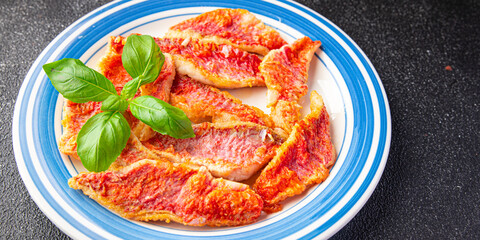 red mullet fillet seafood tropical fish snack meal food snack on the table copy space food background 