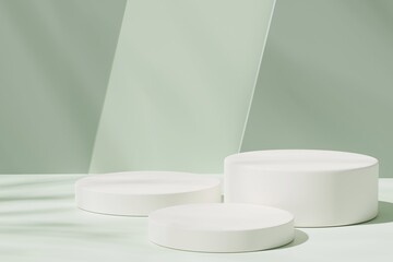 Three white round podiums on a green background, 3d render