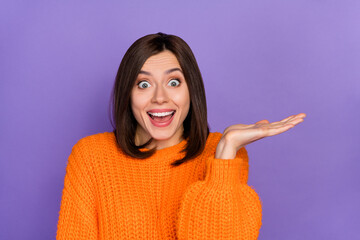 Photo of impressed crazy girl open mouth arm hold empty space proposition isolated on violet color background