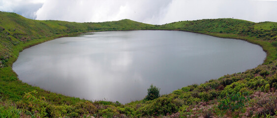 Freshwater lagoon on El Junco hill - San Cristobal island of the Galapagos archipelago - Ecuador