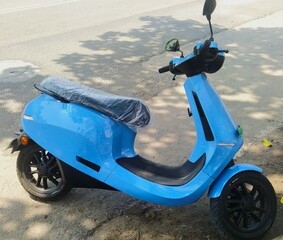 Photo of blue Ola electric scooter parked on the roadside in Bangalore © Deepu