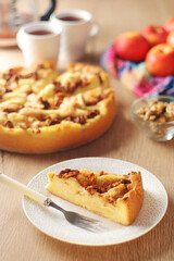 Apple pie with walnuts - typical autumn dish	