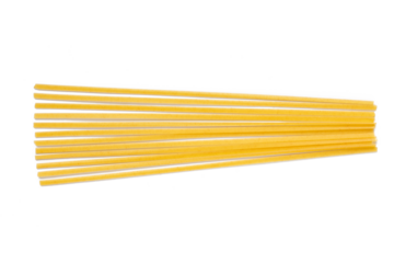 Pile of uncooked dry durum fettuccine pasta isolated on white background. Raw spaghetti or noodles