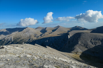 Mystical hiking trail leading to Mount Olympus (Mytikas, Skala, Stefani, Skolio), Mt Olympus National Park, Macedonia, Greece, Europe. Scenic view of cloud covered soft hills and highlands. Hike
