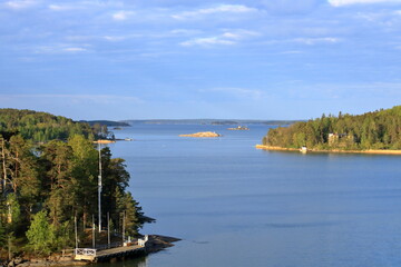 Beautiful scenery of natural environment of Turku archipelago surrounded with the greenery of pine...