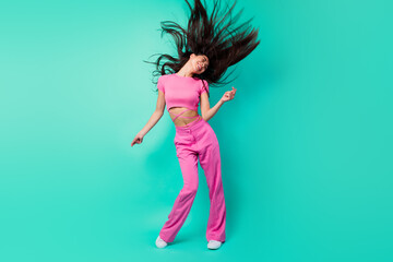 Full size image of rejoiced laughing girl feel free dancing in nightclub flying hair isolated on...